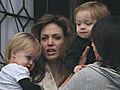 SNTV - Angelina Jolie debuts twins