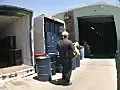 Royalty Free Stock Video SD Footage Worker Unloads a Delivery Truck in Ft. Lauderdale,  Florida