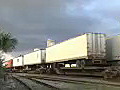 Royalty Free Stock Video HD Footage Freight Train Cars Pass by on the Tracks in Fort Lauderdale,  Florida