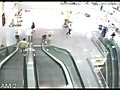 Man Saves Kid Falling Off Escalator