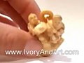 Mammoth Ivory Netsuke -Two Children on a Coin