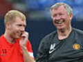 Scholes stays on as coach