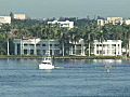 Royalty Free Stock Video HD Footage Sport Fishing Boat Passes by a Mansion on the Intracoastal Waterway in Ft. Lauderdale,  Florida