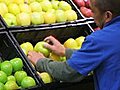 Man Facing Produce 02 Stock Footage