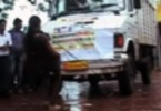 Indian woman pulls truck with teeth