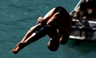 Russia’s Artem Silchenko wins cliff diving round in Switzerland