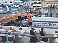 Funny Car Swallows Up Mechanic