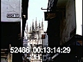 BUSY CANTERBURY STREET WITH CATHEDRAL IN BACKGROUND