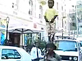 A Father Balances His Baby Boy On His Head & Does Amazing Tricks In Africa!