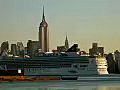 Royalty Free Stock Video HD Footage Cruise Ship Passes by New York City Skyline From New Jersey on a Sunny Day