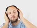 Man with headphones listening to music,  isolated on white