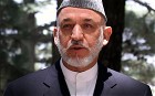 President Karzai buries slain brother in Kandahar