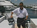 Royalty Free Stock Video SD Footage Crew Member Working on a Yacht in Ft. Lauderdale,  Florida