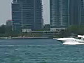 Royalty Free Stock Video HD Footage Power Boat Arrives at a Marina on Key Biscayne in Miami,  Florida