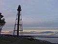 Royalty Free Stock Video SD Footage Zoom Out to Lighthouse and Harbor at Dusk in Marblehead,  Massachusetts