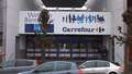 Carrefour predicts profit slide