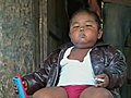Shocking pics of two-year-old smoking boy