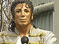 Al Fayed unveils Jackson statue.