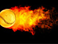 Baseball fireball in flames on black background