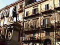 Royalty Free Stock Video HD Footage Pan Left to an Apartment Building With Balcony’s in Monreale,  Sicily