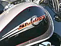 Royalty Free Stock Video SD Footage Zoom Out to a Bike at the Fun in the Sun Toy Run in Ft. Lauderdale,  Florida in 2003