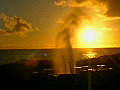 Royalty Free Stock Video SD Footage Static Shot of Blowhole Splashing Water at Sunset in Kauai,  Hawaii