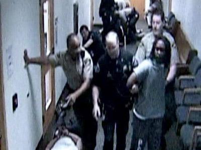 Raw Video: Brawl erupts at murder trial