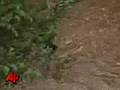 Girl Fights Okla Flood Waters