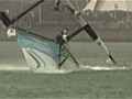 Racing boat in dramatic capsizing