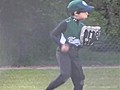 Little Outfielder Plays Air Guitar