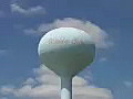 Royalty Free Stock Video HD Footage Zoom Into a Landmark Water Tower in Florida City,  Florida