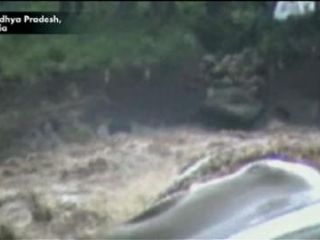 Caught on Tape: Boy Rescued from Floodwaters