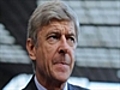 Wenger hits back at Evra jibes