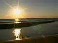 Royalty Free Stock Video SD Footage Static Shot of Sunset and Shoreline on Beach in Kauai,  Hawaii