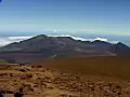 Royalty Free Stock Video SD Footage Pan Left To Haleakala Crater and Cloud Covered Mountains in Maui,  Hawaii