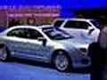 Reeling Automakers Plug Green Cars
