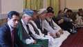 Karzai attends service for brother