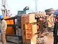 Delhi: Crane topples on cars