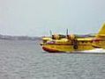 CL-215 Water Bomber fighting fires. Excellent close up and sound.