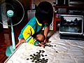 My niece counting the Pennies in Thai