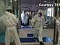 Japan nuclear workers downplay danger