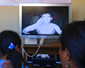 Trapped Chile miners hold video conference with kin