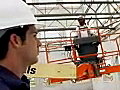 Royalty Free Stock Video SD Footage General Contractor Watches a Steel Worker at a Construction Site in Ft. Lauderdale,  Florida