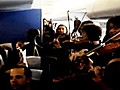 Orchestra Plays Concert on a 747