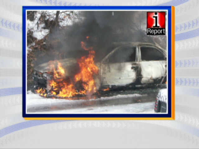 Frozen car goes up in flames