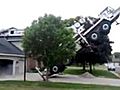 Crane Smashes House