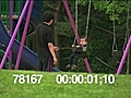 FATHER AND SON AT THE SWINGSET - HD