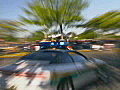 Royalty Free Stock Video SD Footage Zoom In and Out to Flashing Blue Lights of a Police Cruiser