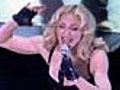 Entwrap: Madonna kisses girl in new video