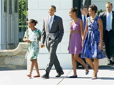 Despite looming deadline,  Obama enjoys summer day